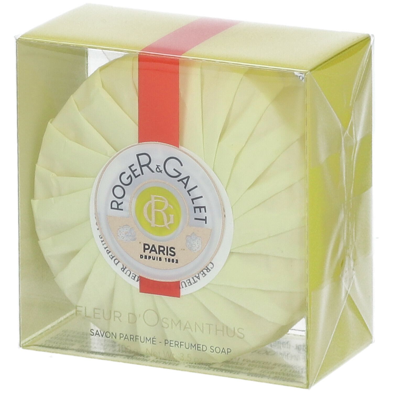 Runde Seife in gelber Verpackung. Roter Streifen. Logo: Roger & Gallet. Text: Fleur d'Osmanthus, Savon Parfume.