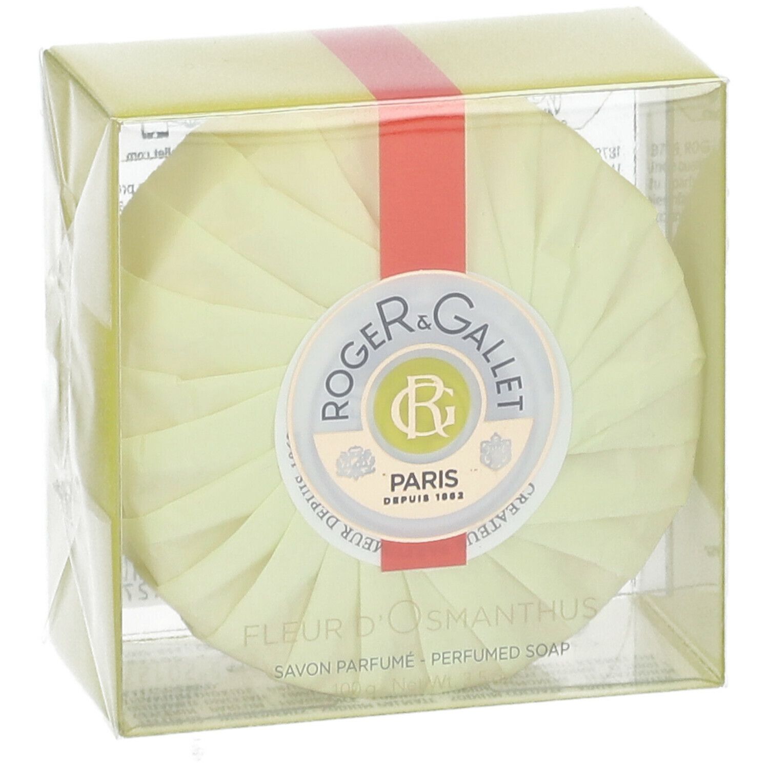 Runde Seife in gelber Verpackung. Roter Streifen. Logo: Roger & Gallet. Text: Fleur d'Osmanthus, Savon Parfume.