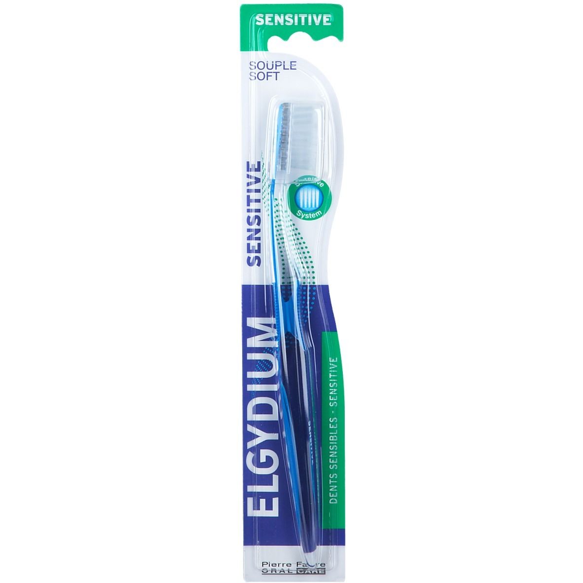 Blaue Zahnbürste mit weißem Bürstenkopf in Verpackung. Aufschrift: ELGYDIUM SENSITIVE. Pierre Fabre ORAL CARE.