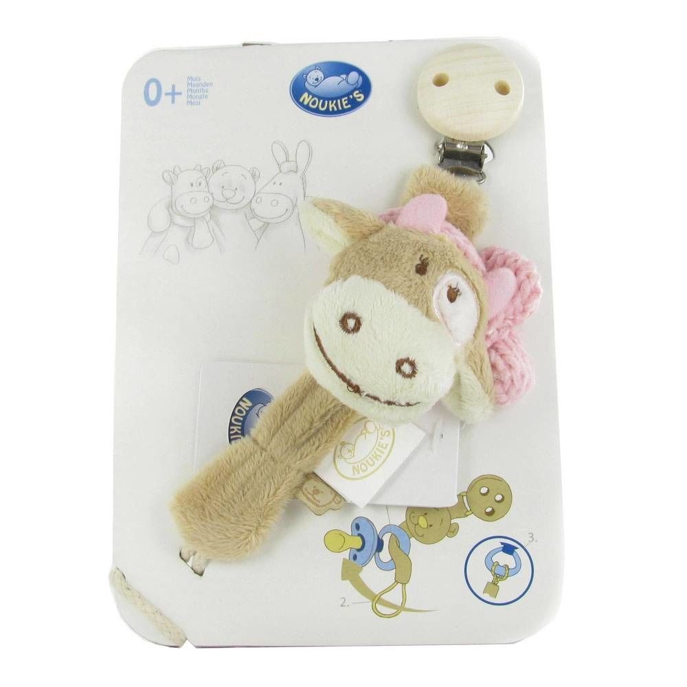 Nuckelhalter mit Kuh-Plüschtier. Beige, rosa und weiß. Auf Verpackung mit Logo und Zeichnungen. Altersempfehlung: 0+.