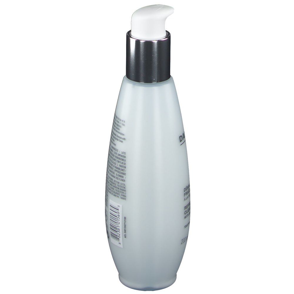 Weißliche Flasche mit silbernem Pumpkopf. Seitliche Ansicht mit Text und Barcode.