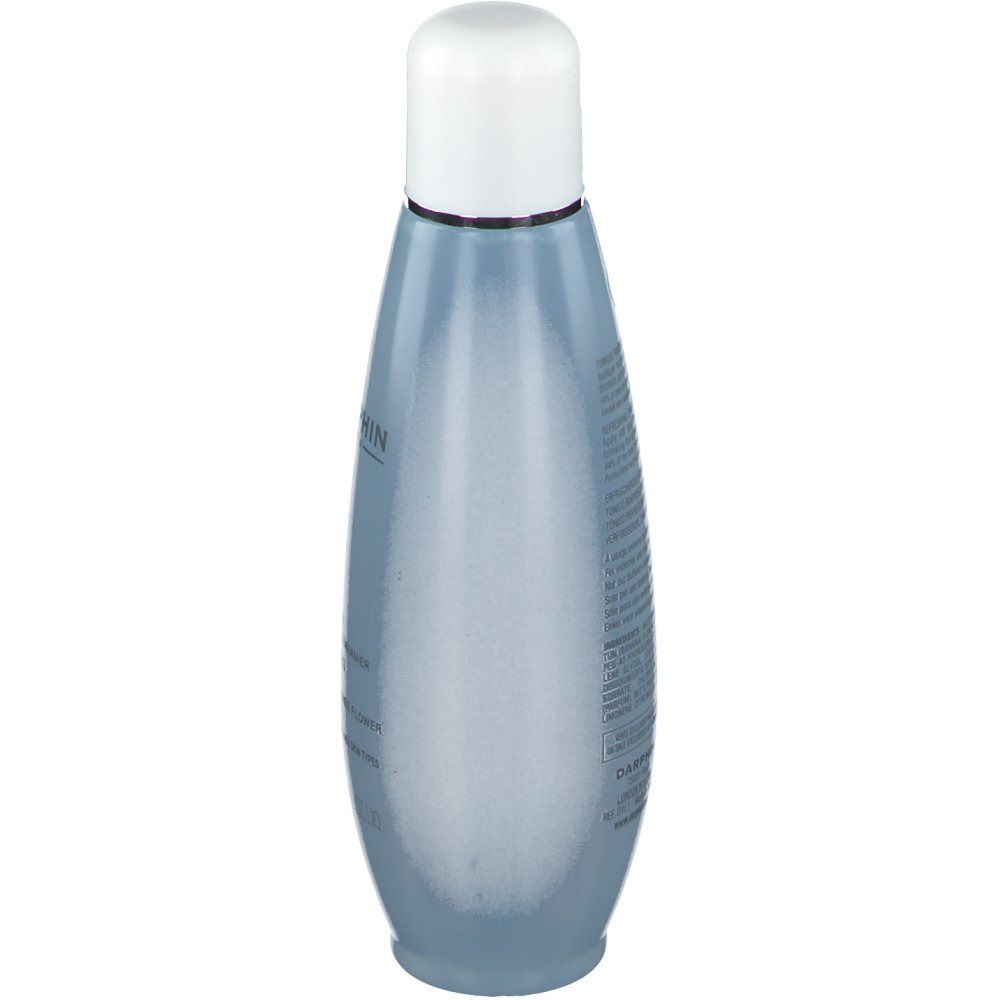 Vue arrière d'un flacon bleu transparent avec bouchon blanc. Texte sur le flacon.