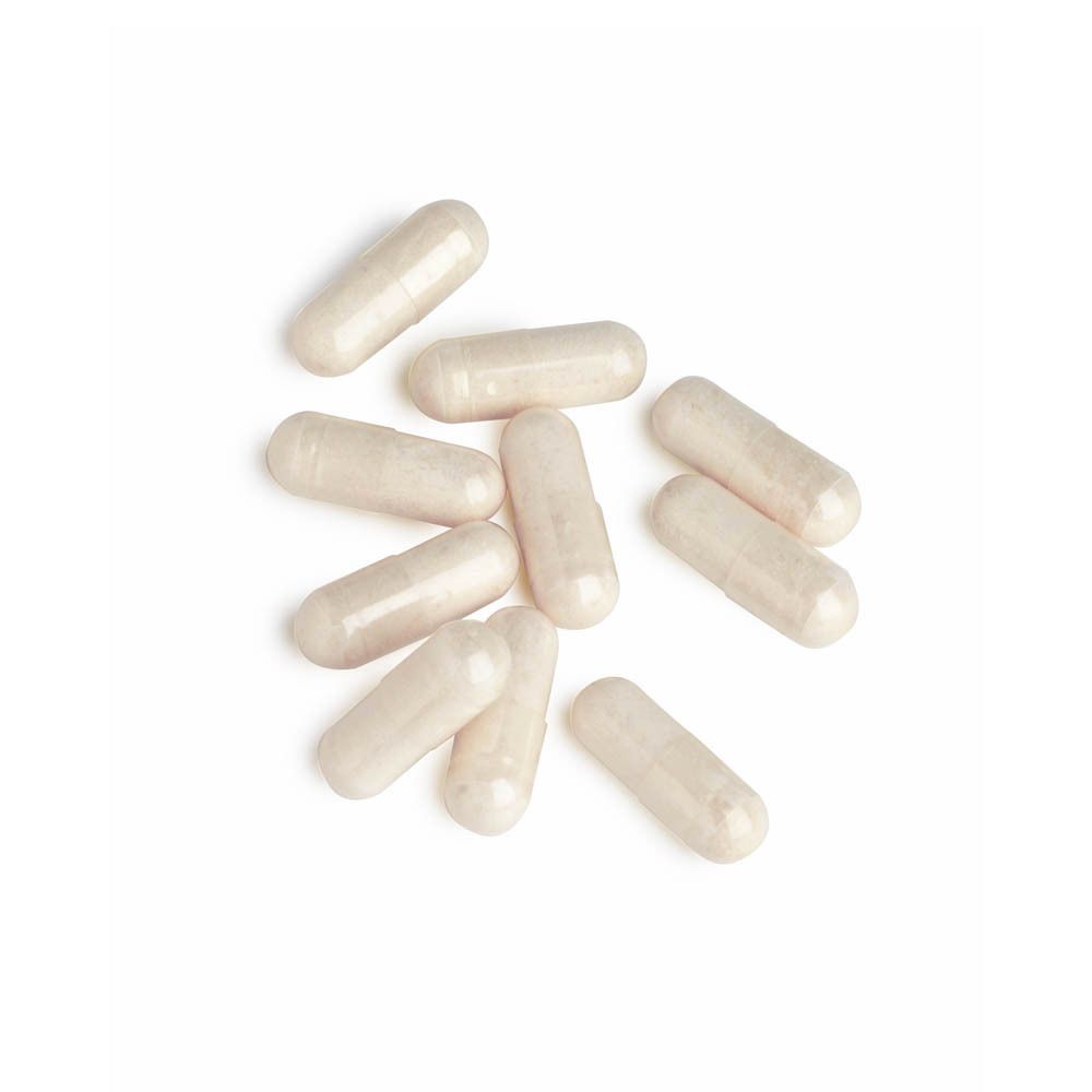 Haufen von Kapseln. Hellbraune, längliche Form.