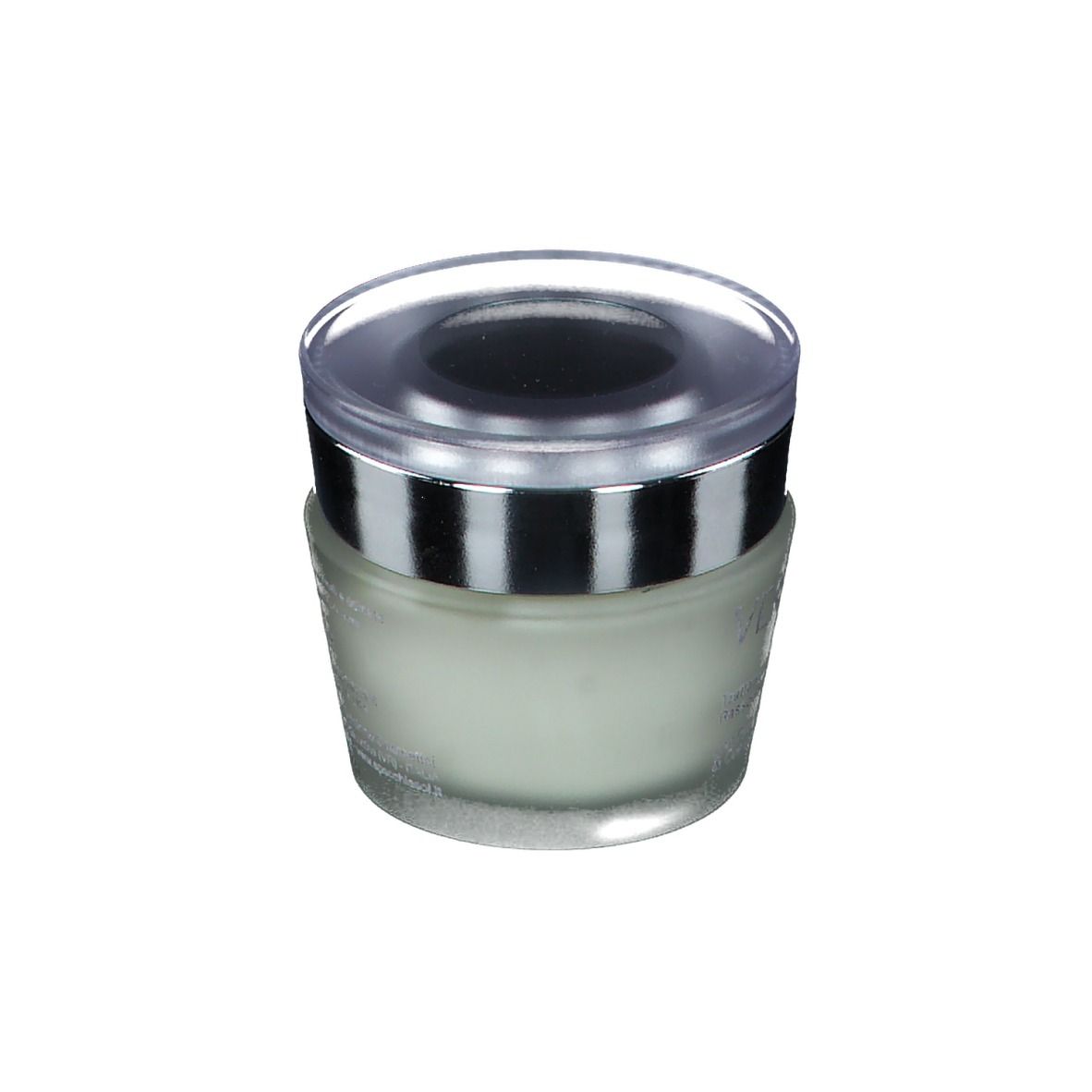 Pot de crème avec bord argenté et couvercle transparent. Produit partiellement visible. Inscription partiellement lisible.