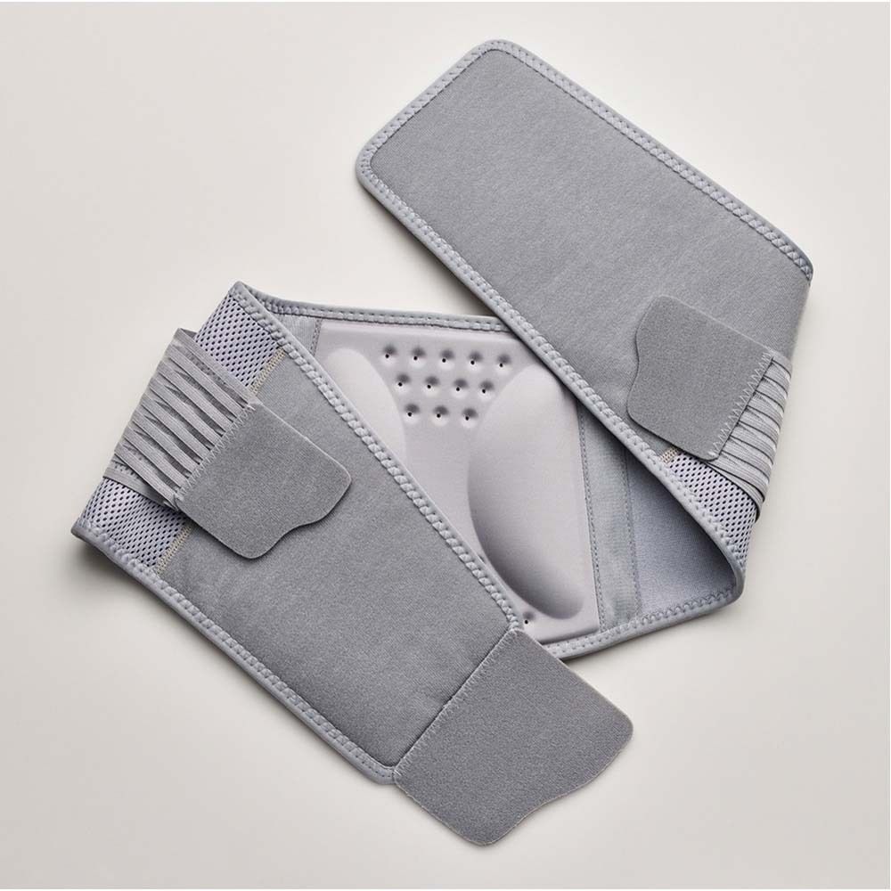 Produktverpackung mit Rückenbandage. L/XL-Größe. Produktname und Logo.