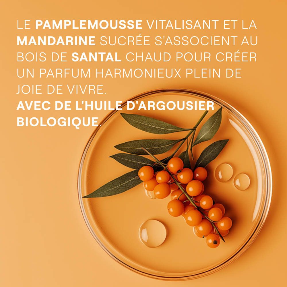 Texte sur fond orange: Le pamplemousse vitalisant et la mandarine sucrée... Avec de l'huile d'argousier biologique.