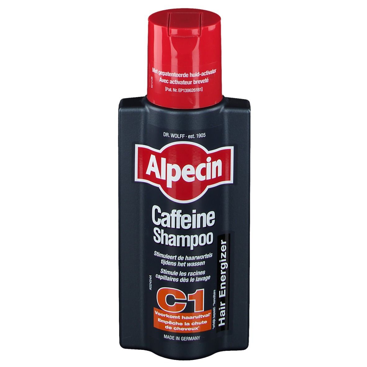 Flacon bleu foncé avec bouchon rouge. Inscription Alpecin Caffein Shampoo. C1, empêche la chute.
