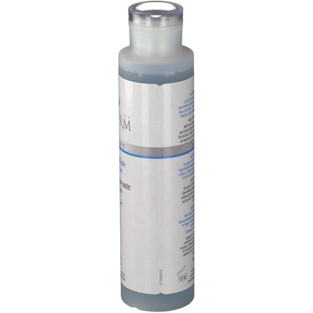 Zylindrische Flasche, blaue Flüssigkeit. Aufschrift: Seaderm Seasoft. Etikett mit Text. Transparenter Verschluss.