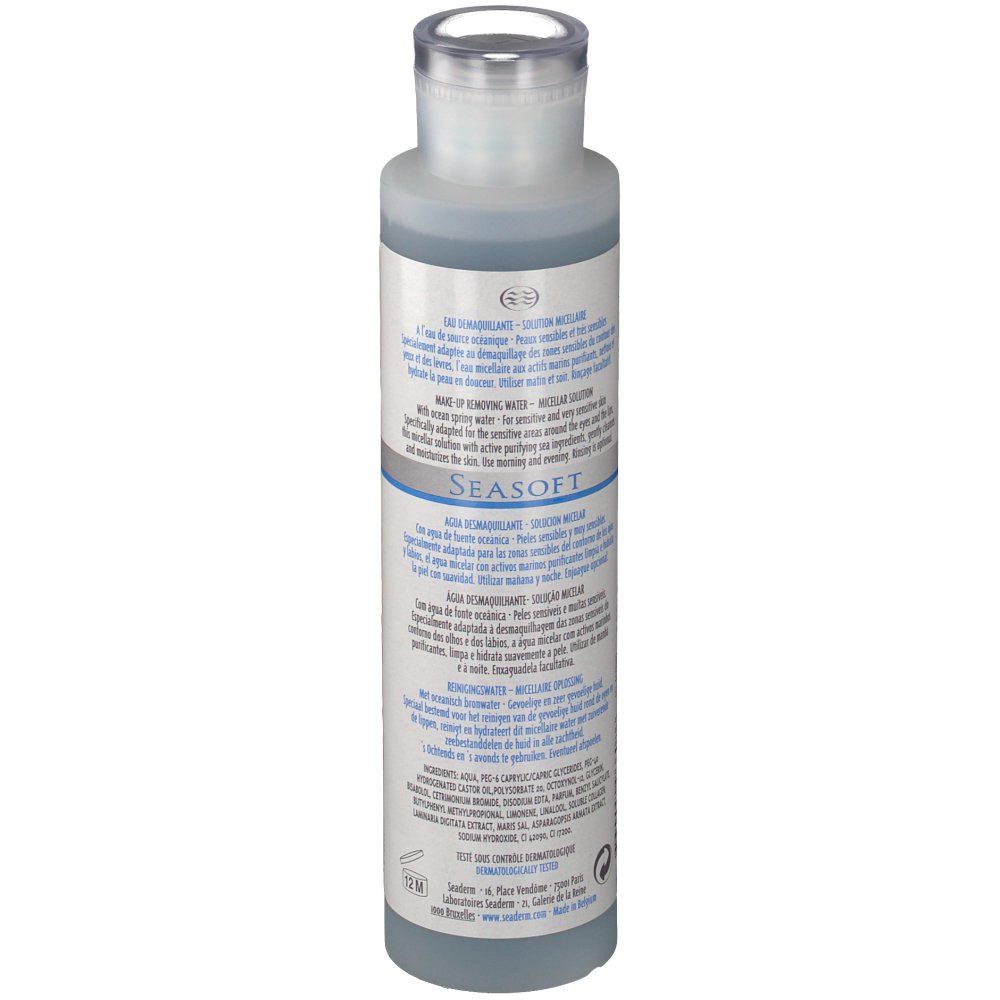 Zylindrische Flasche, blaue Flüssigkeit. Rückseite mit Text. Aufschrift: Seaderm Seasoft. Transparenter Verschluss.