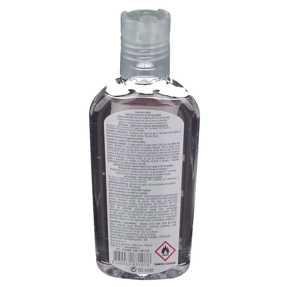 Dos d'un flacon transparent avec texte. Avertissement et ingrédients.