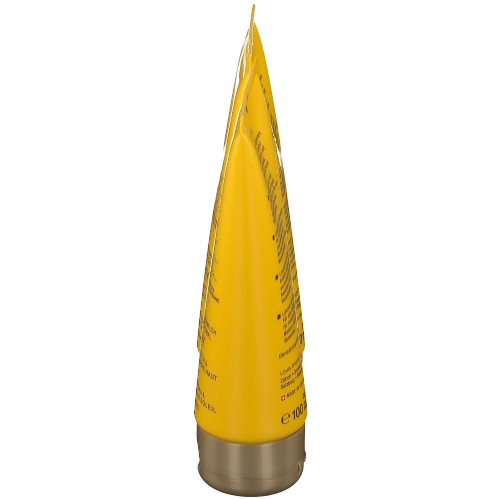 Gelbe Tube, goldfarbener Verschluss. Text auf der Tube. Aufdruck: e 100 ml.