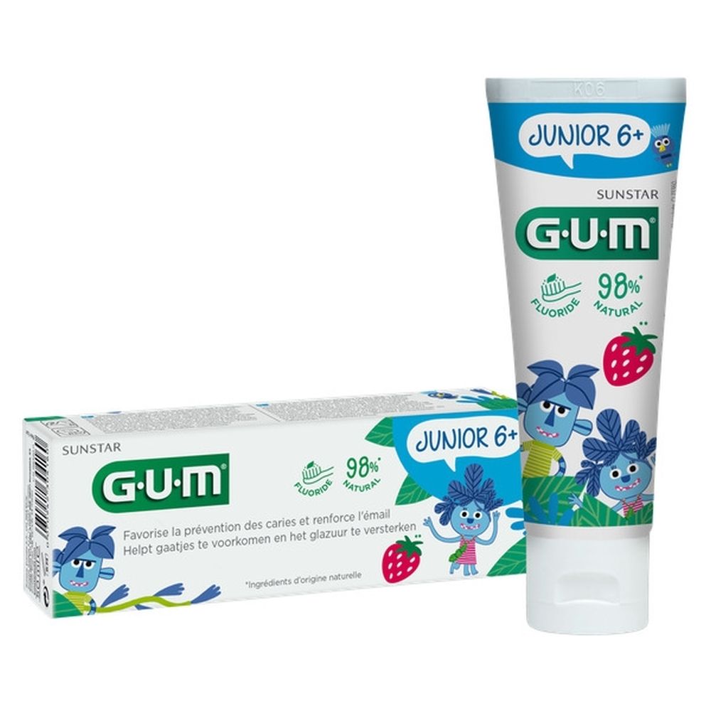 Tube et boîte de dentifrice G.U.M Junior 6+ avec fraise. Contient du fluorure et est à 98% naturel.