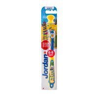 Brosse à dents enfant bleu clair, blanche et rose. Emballage avec informations produit. 6-9 ans.