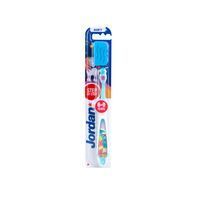 Brosse à dents enfant orange, grise et jaune. Emballage avec informations produit. Recommandé pour 6-9 ans.