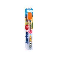 Brosse à dents enfant bleue, verte et blanche. Emballage avec informations produit. Recommandé pour 6-9 ans.