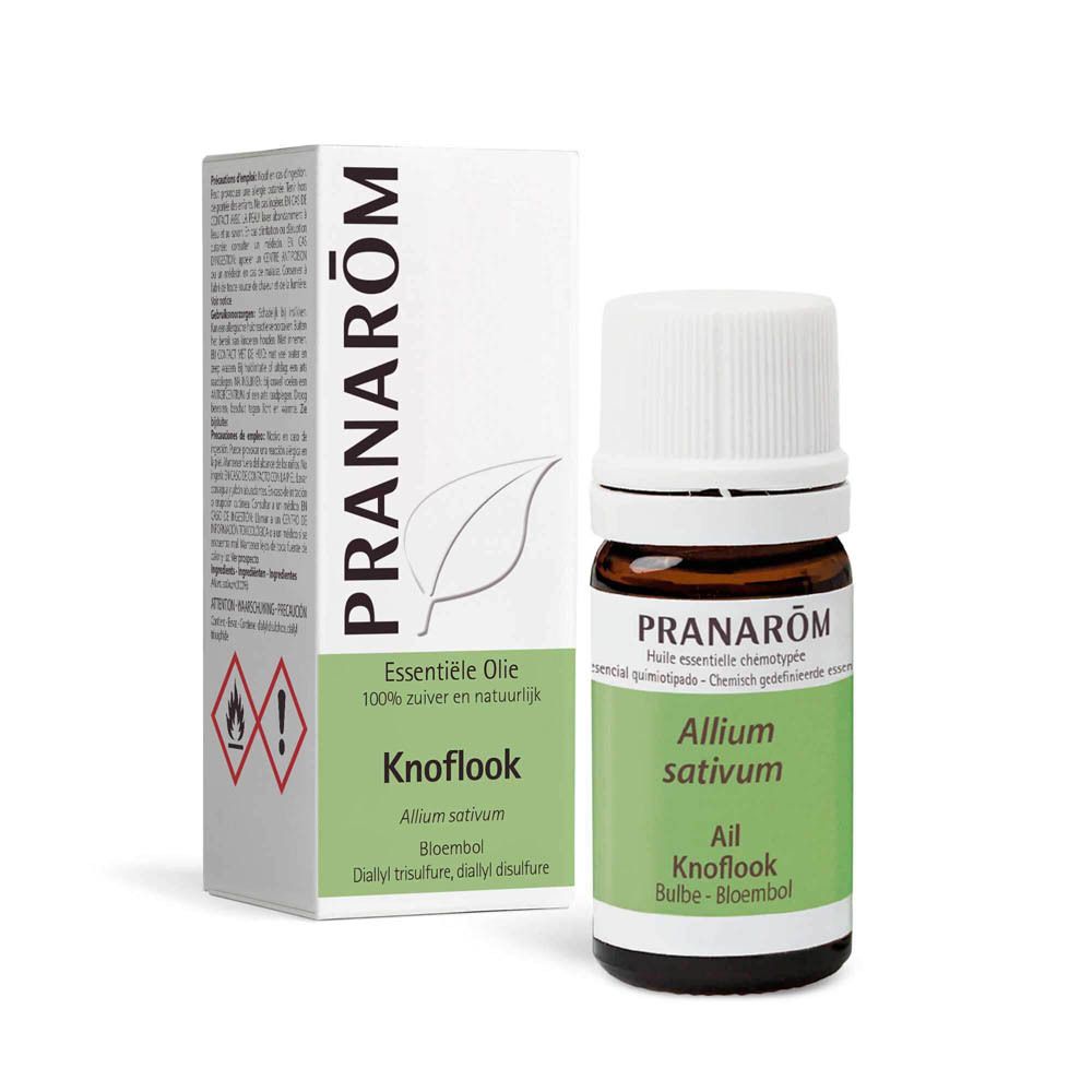 Braune Glasflasche und weiße Schachtel. Schachtel mit PRANAROM, Essentiele Olie, Knoflook, Allium sativum.