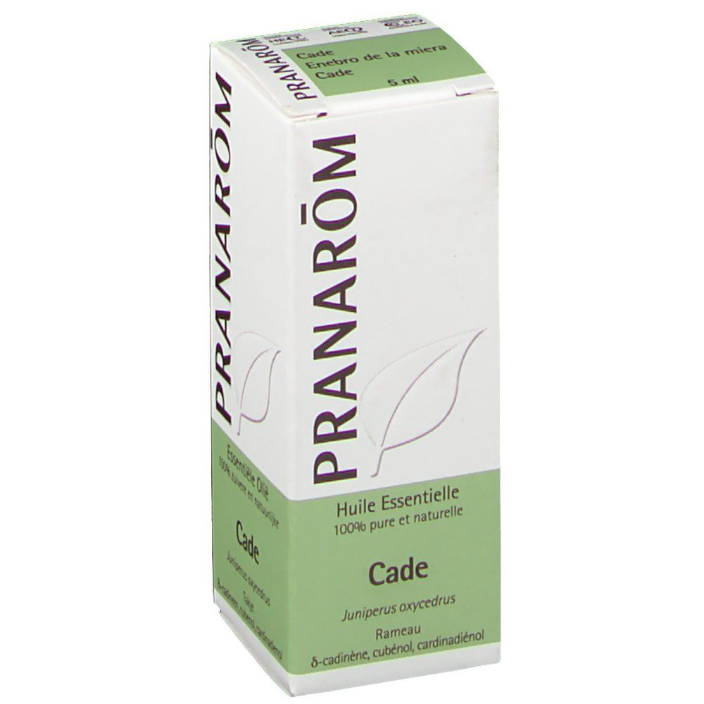 Boîte PRANAROM Cade, 5 ml. Inscription Cade, Enbre de la mièra. Texte vert sur fond blanc. Illustration d'une feuille.