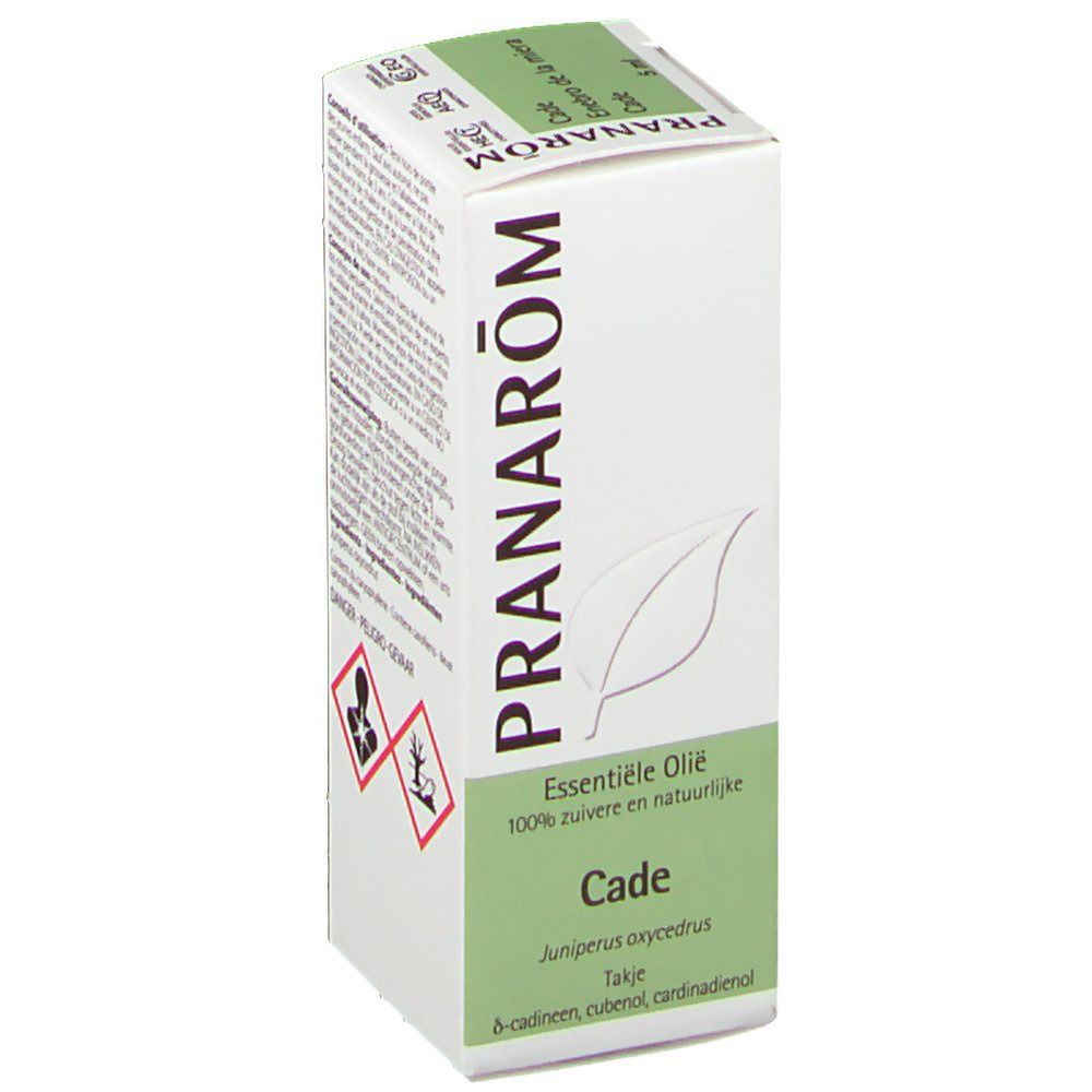 Boîte PRANAROM Cade. Inscription: Essentiele Olie, 100% zuivere en natuurlijke. Cade, Juniperus oxycedrus. Symboles de danger.