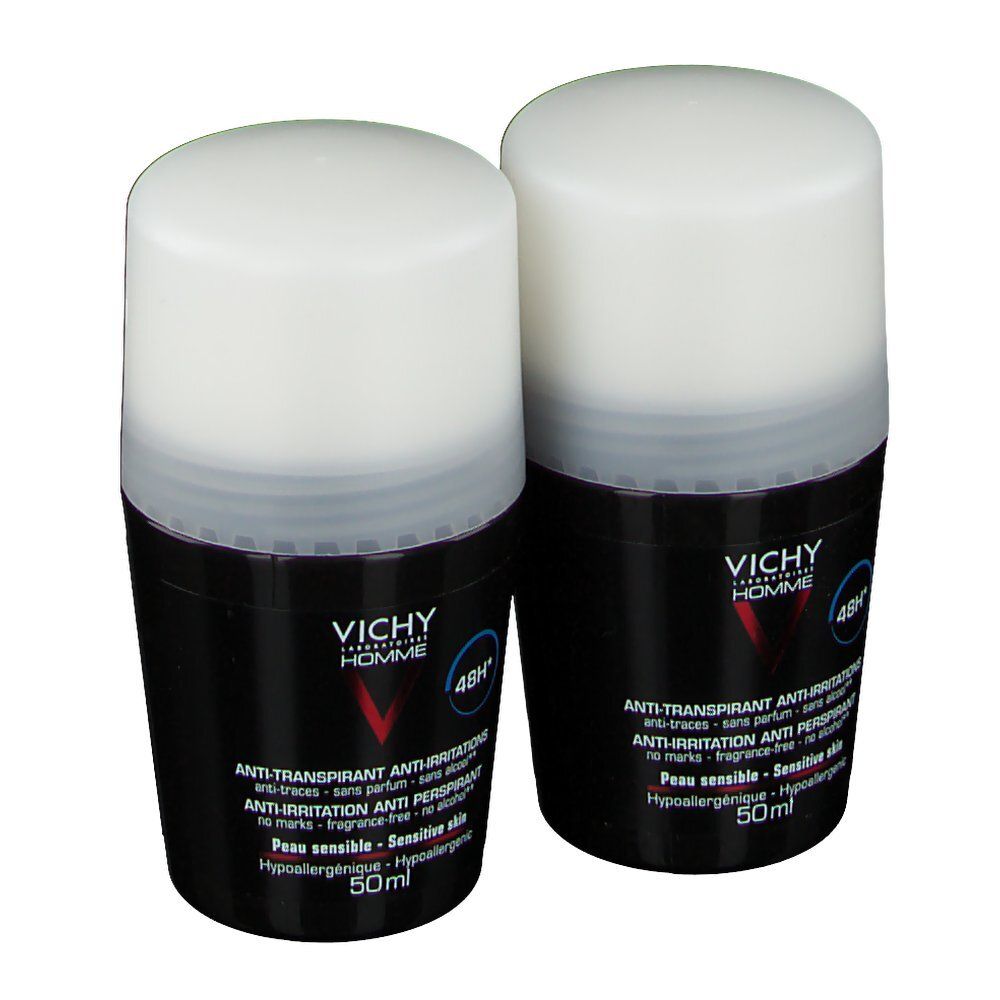 Deux déodorants roll-on. Récipients noirs avec couvercles blancs. Logo Vichy Homme et informations produit.
