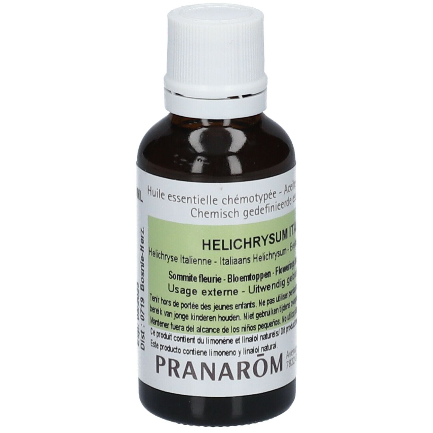 Flacon en verre brun avec bouchon blanc. Étiquette avec texte: Helichrysum italicum, PRANAROM.