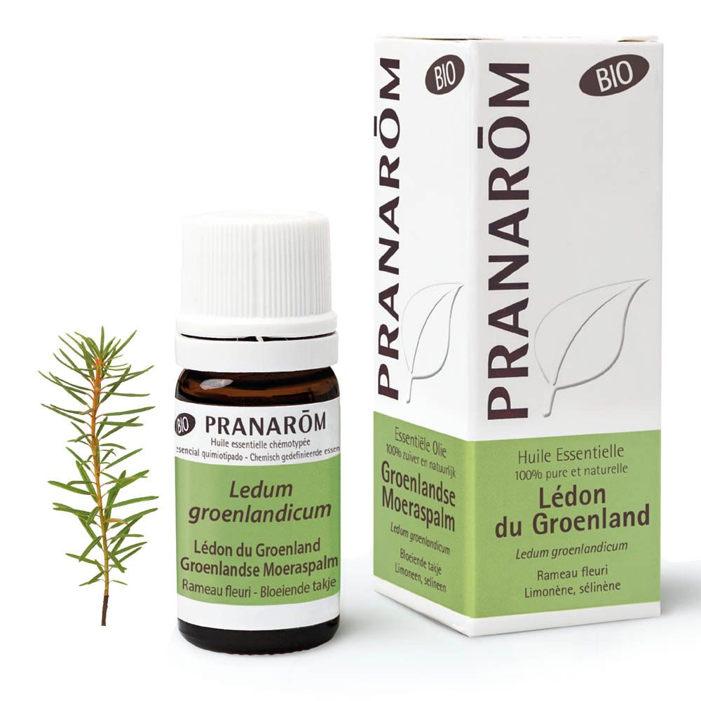 Flacon en verre brun avec bouchon blanc et étiquette. Nom du produit et certification biologique.