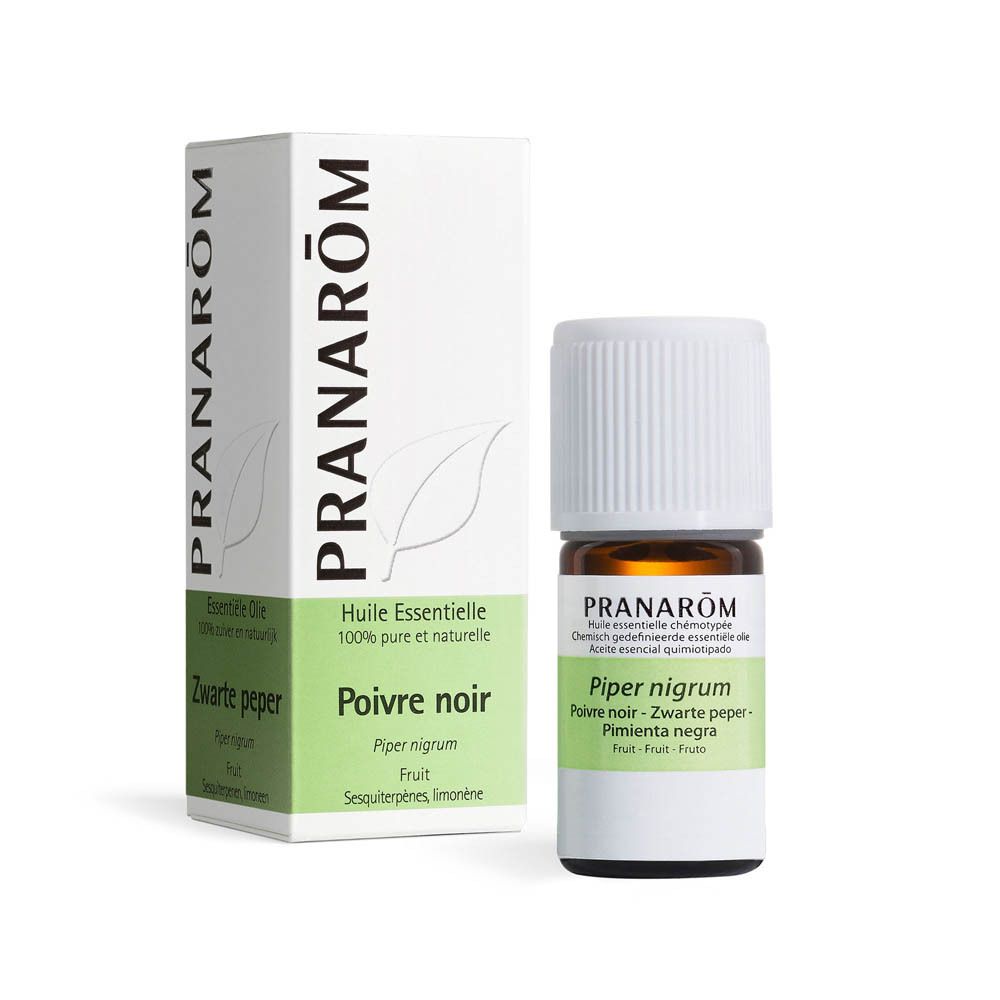 Emballage et flacon. Boîte blanche avec accents verts. Marque : Pranarôm. Inscription : Huile Essentielle. Nom du produit : Poivre noir.