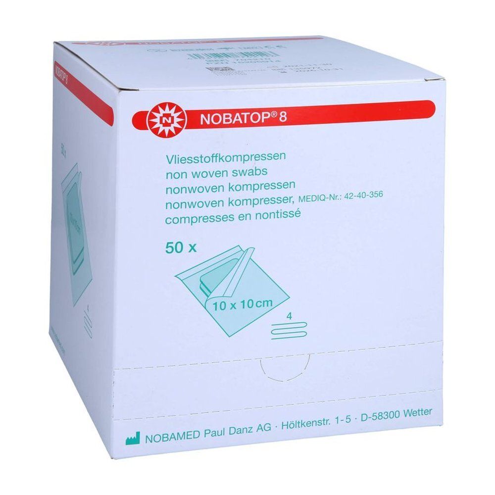 Boîte blanche NOBATOP® 8 avec accent rouge. Contient 50 compresses stériles non tissées 10 x 10 cm. Nom du produit.