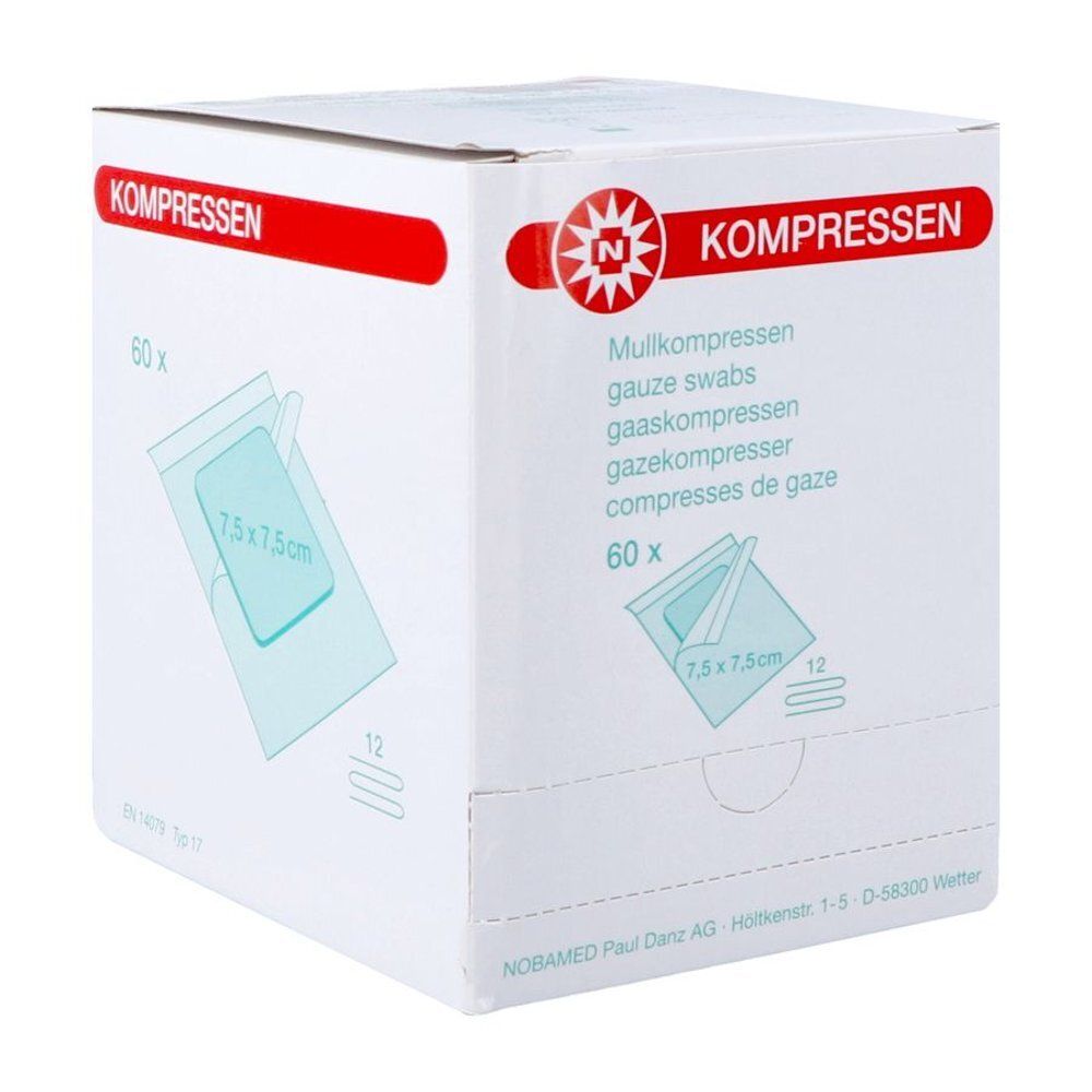 Boîte de compresses de gaze. Inscription: 60 pièces, 7,5 x 7,5 cm. Marque NOBAMED.