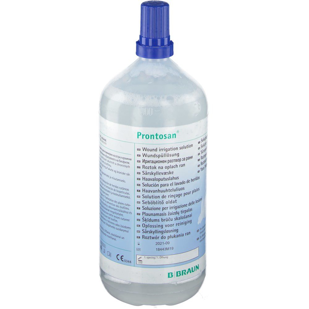 Flasche mit blauem Verschluss. Aufschrift: Prontosan. Produktetikett mit Informationen. Marke B. Braun.