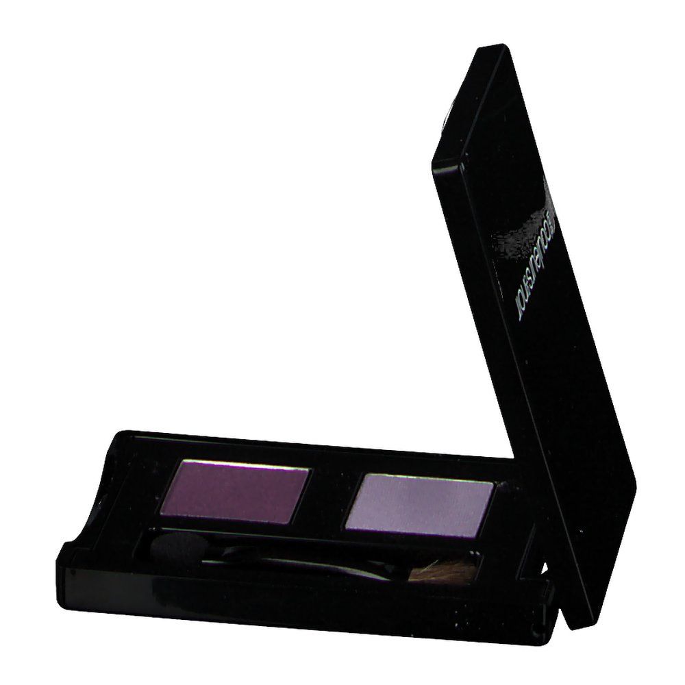 Lidschatten-Duo in schwarzer Verpackung. Zwei Farbtöne: Lila und Pflaume. Mit Applikator. Deckel halb geöffnet.