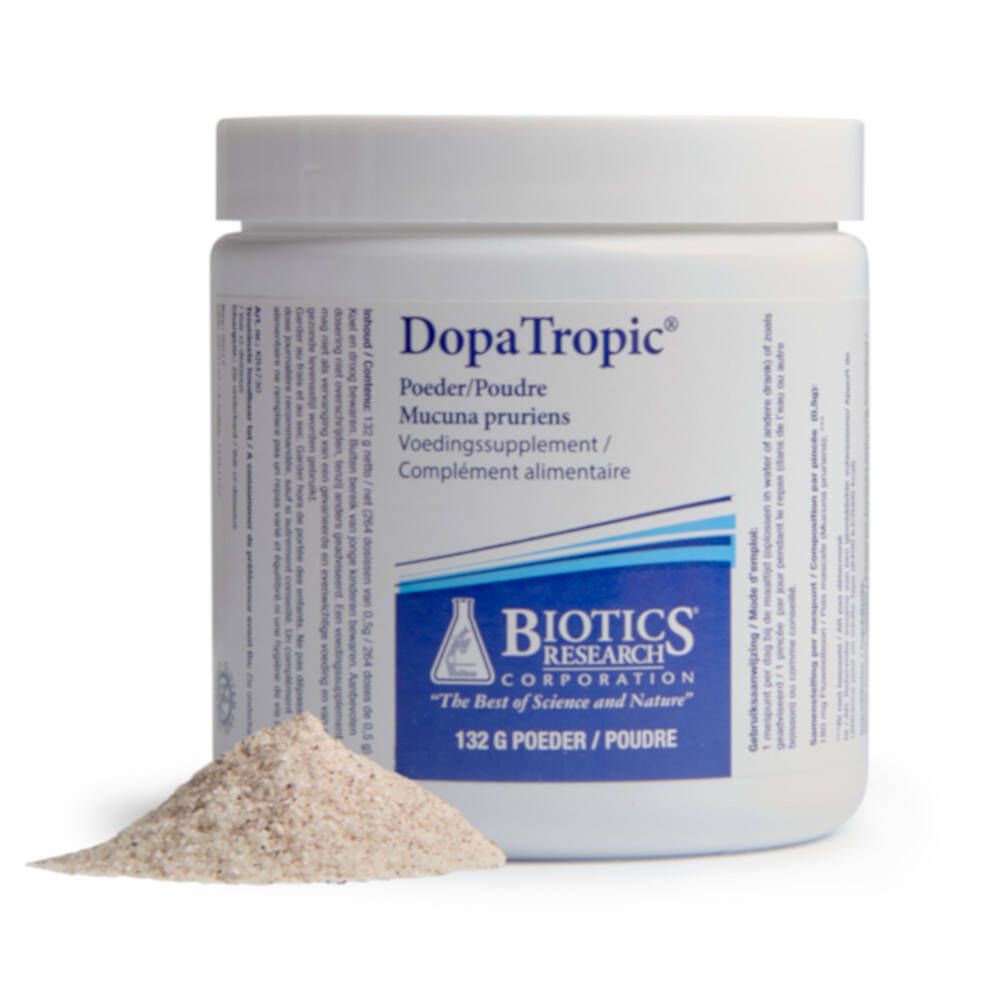 Récipient blanc avec étiquette bleue. Inscription: DopaTropic, Biotics Research Corporation. Tas de poudre à côté. Couvercle en haut.