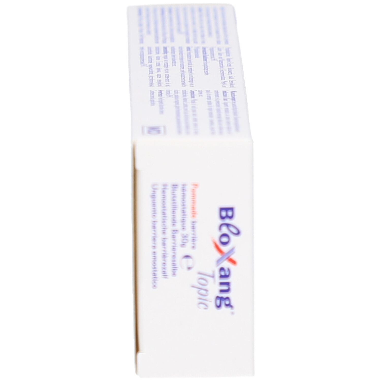 Seitenansicht der weißen Schachtel mit Bloxang Topic. Aufschrift: Pommade barrière hémostatique.