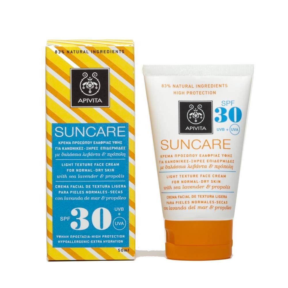 Tube et emballage de crème solaire. Inscription : APIVITA Suncare SPF30. Pour peaux normales à sèches. Contient de la lavande de mer et de la propolis.