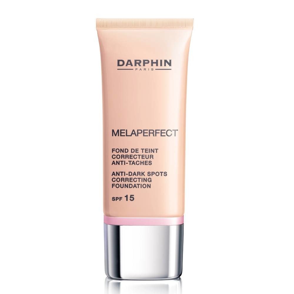 Darphin Melaperfect Fond De Teint Correcteur Ivoire SPF 15. Tube de fond de teint rose, bouchon argenté. Texte sur le tube.