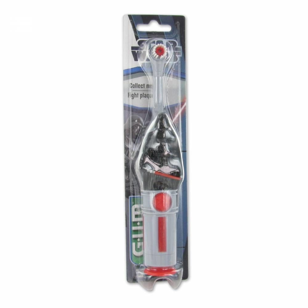Zahnbürste in Verpackung. Der Griff ist weiß mit rotem Akzent. Der Bürstenkopf ist transparent. Auf der Verpackung ist das Star Wars Logo.