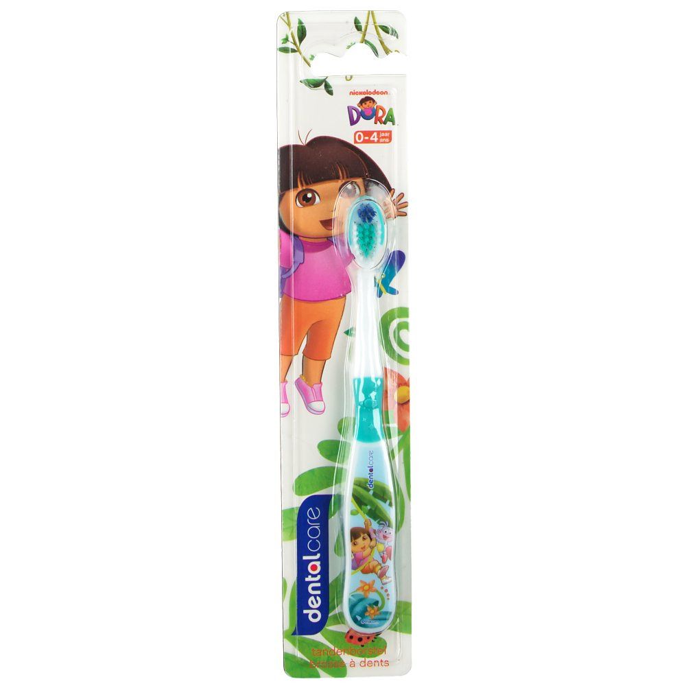 Brosse à dents enfant, verte et blanche, motif Dora. Emballage blister. Logo "dentalcare".