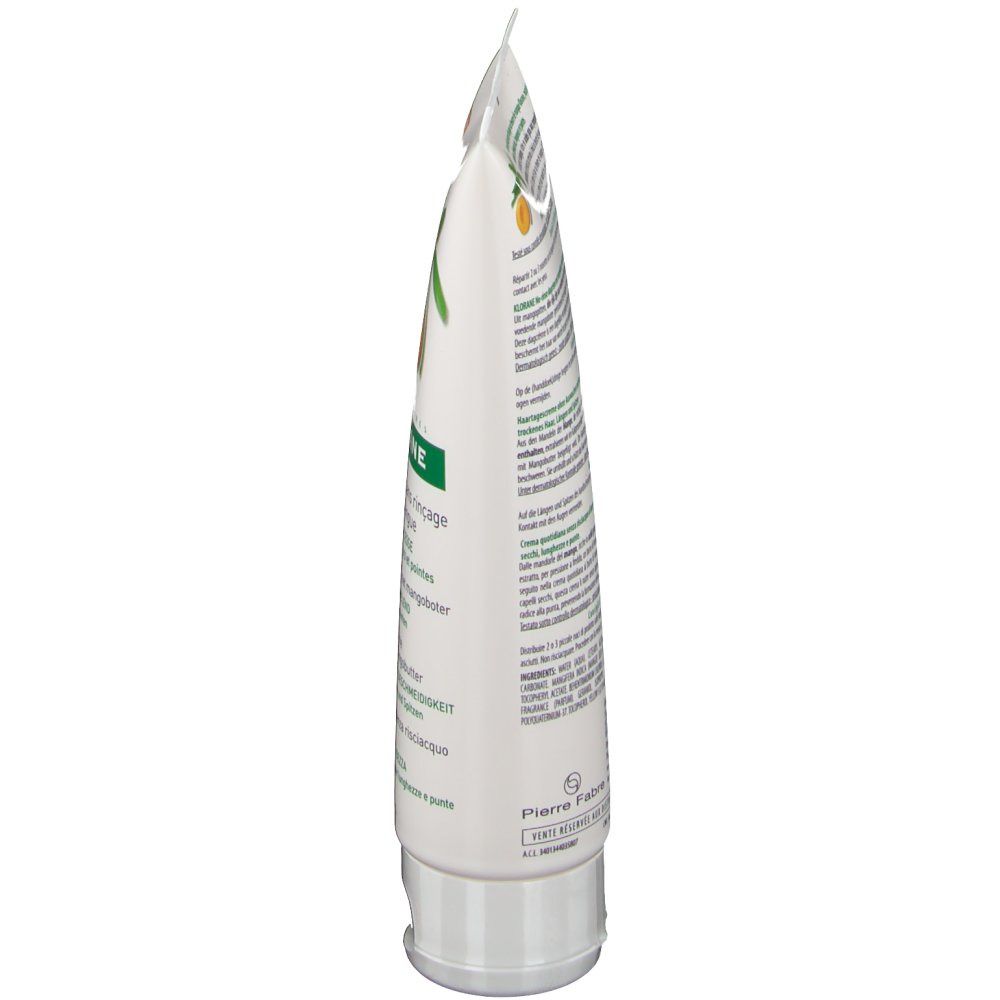 Klorane Tube, Seitenansicht. Weiß, mit Text und grünen Elementen. Aufdruck: Produktinformationen, Inhaltsstoffe, Hersteller.