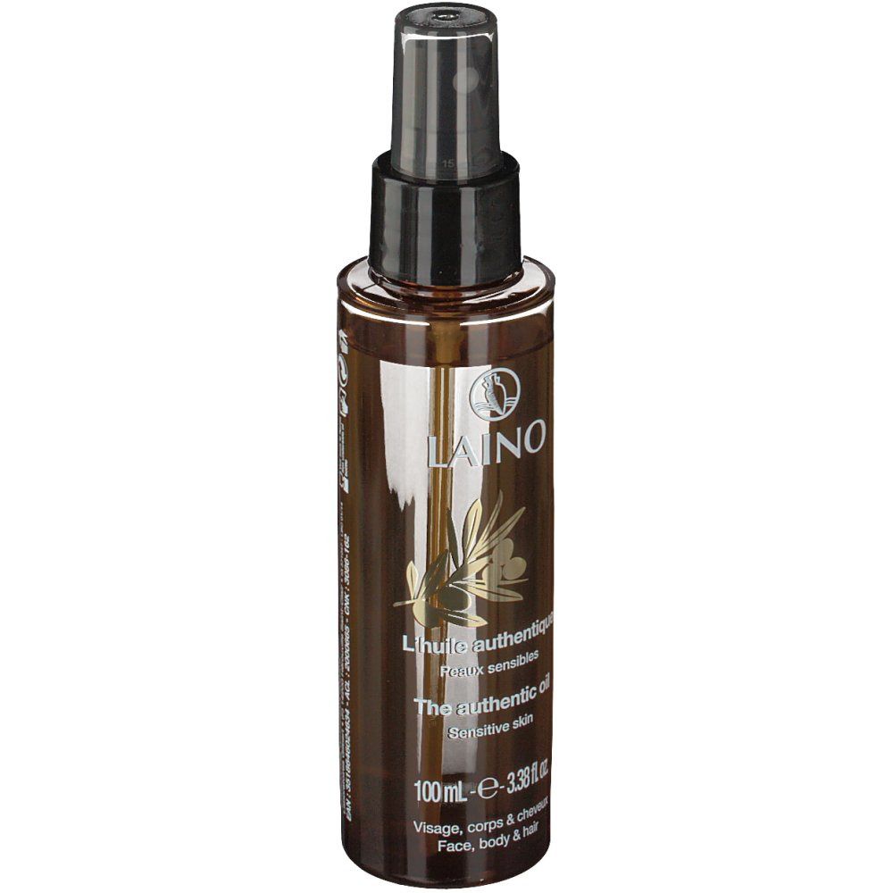 Braune Sprühflasche mit schwarzem Sprühkopf. Aufschrift: LAINO, L'huile authentique, The authentic oil, Sensitive skin.