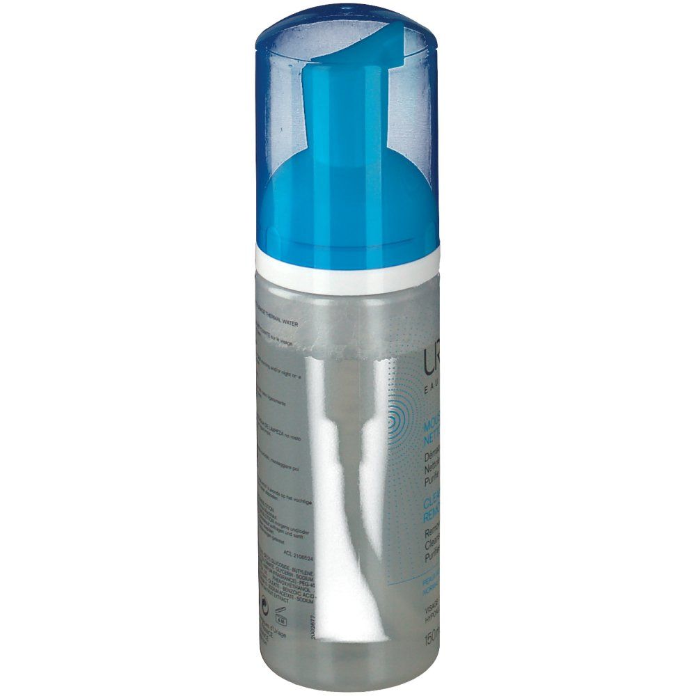Mousse d'eau nettoyante Uriage. Flacon transparent avec pompe bleue. Vue latérale avec texte. Inscriptions: Uriage, Mousse d'Eau, Cleansing Make-up Remover Foam.