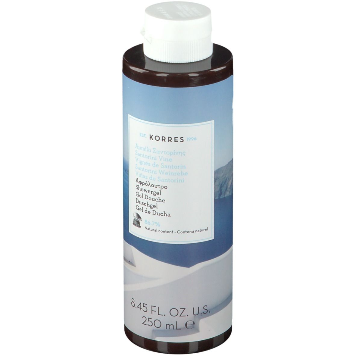 KORRES Duschgel Santorini. Zylindrische Flasche mit weißem Deckel. Etikett mit Produktnamen und Inhaltsangaben.