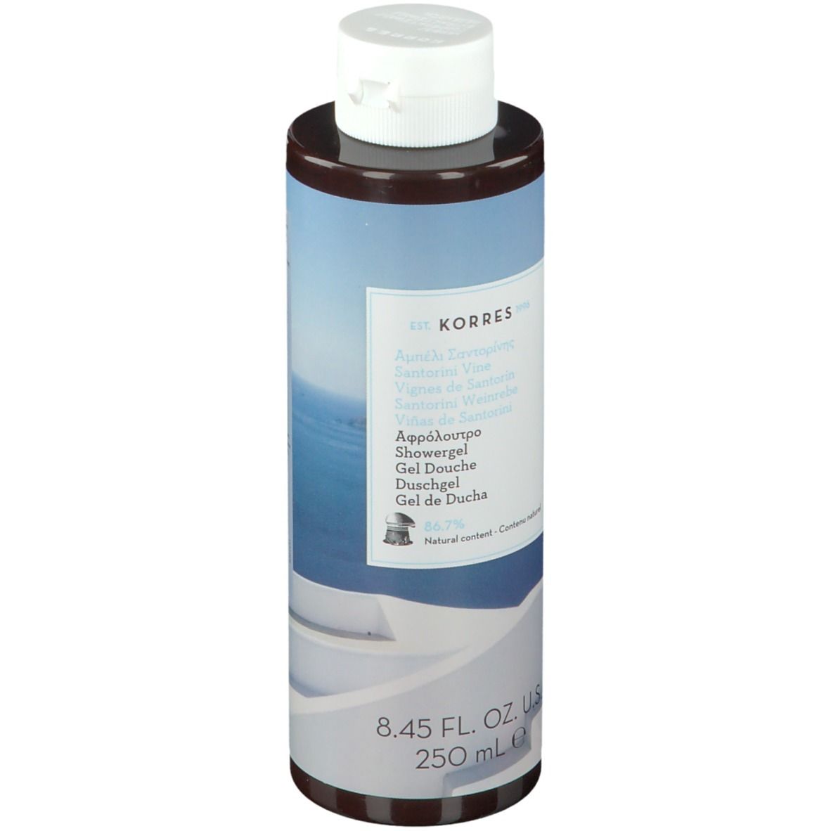 KORRES Duschgel Santorini. Zylindrische Flasche mit weißem Deckel. Etikett mit Produktnamen und Inhaltsangaben.