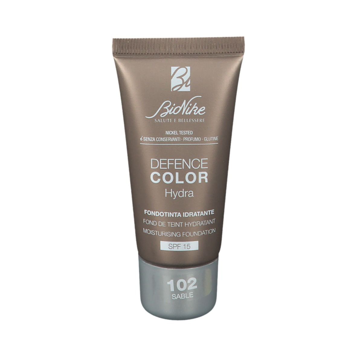 Braune Tube mit Foundation. Aufschrift: Defence Color Hydra, 102 Sable, SPF 15. Marke: BioNike.