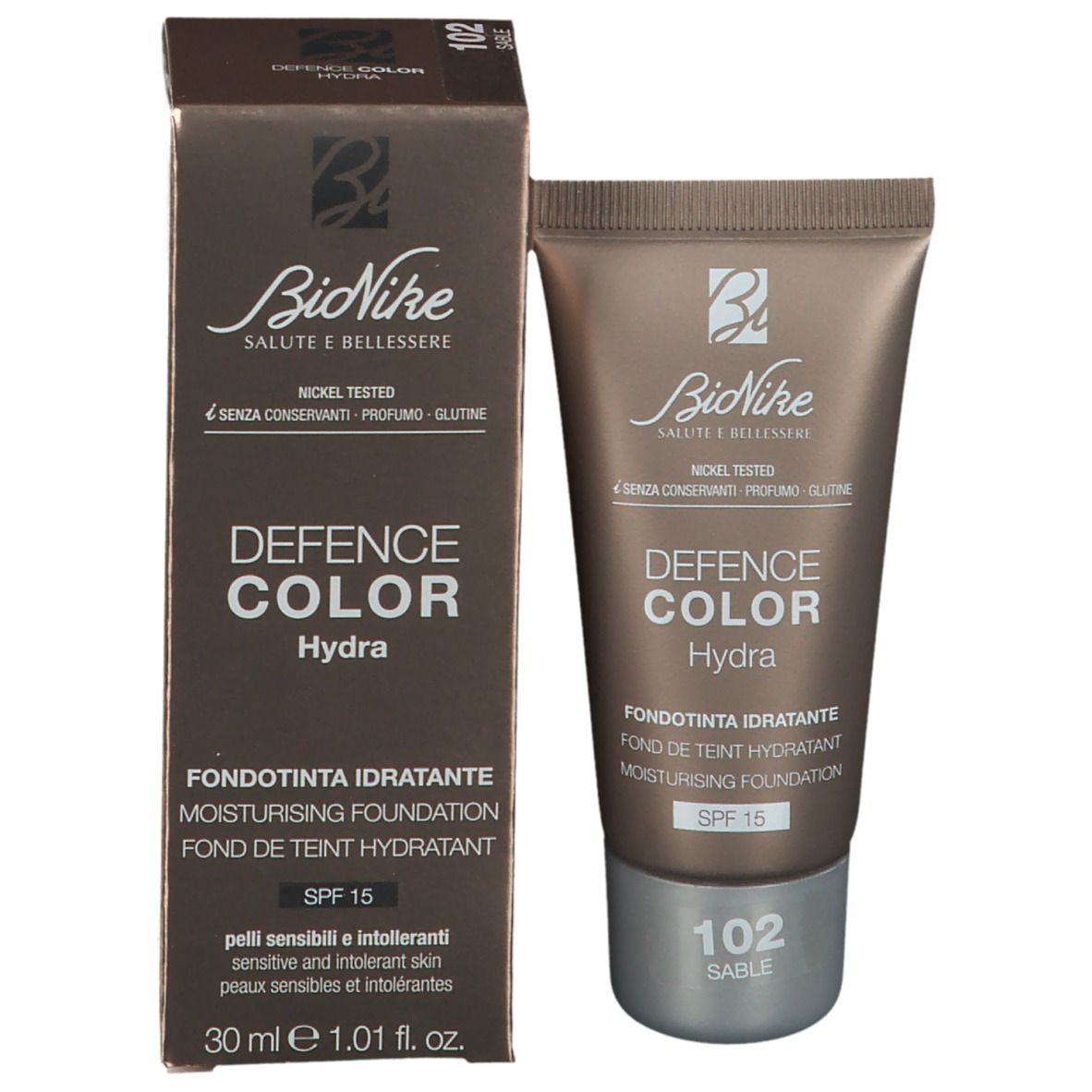 Foundation-Tube und Verpackung. Aufschrift: Defence Color Hydra, 102 Sable, SPF 15. Marke: BioNike.