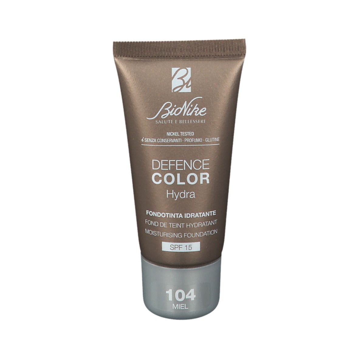 Braune Tube Foundation. Marke BioNike, Defence Color Hydra. Farbton 104 Miel. Mit SPF 15. Nickel getestet.