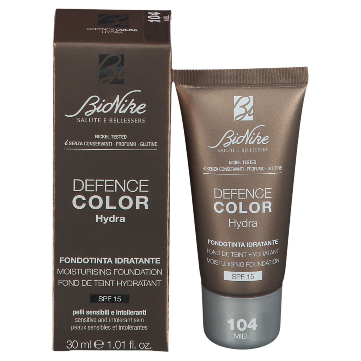 Foundation-Tube und Verpackung. Marke BioNike, Defence Color Hydra. Farbton 104 Miel. Mit SPF 15. Nickel getestet.