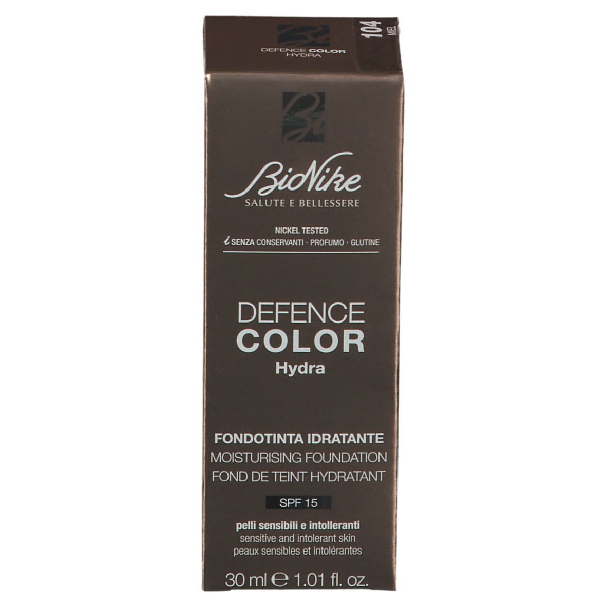 Verpackung der Foundation. Marke BioNike, Defence Color Hydra. Farbton 104 Miel. Mit SPF 15. Nickel getestet.