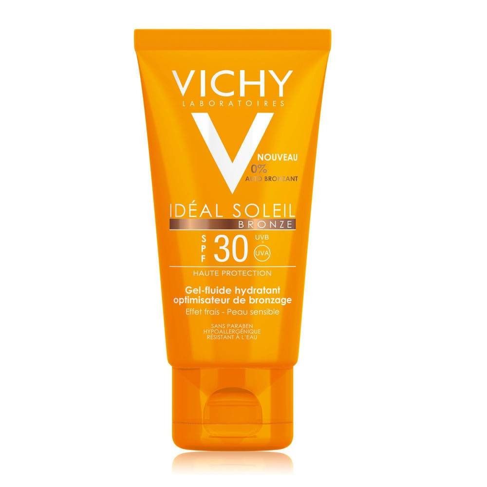 Tube orange avec logo V blanc et texte. Nom du produit: Idéal Soleil Bronze SPF30. Texte: Gel-fluide hydratant optimisateur de bronzage.