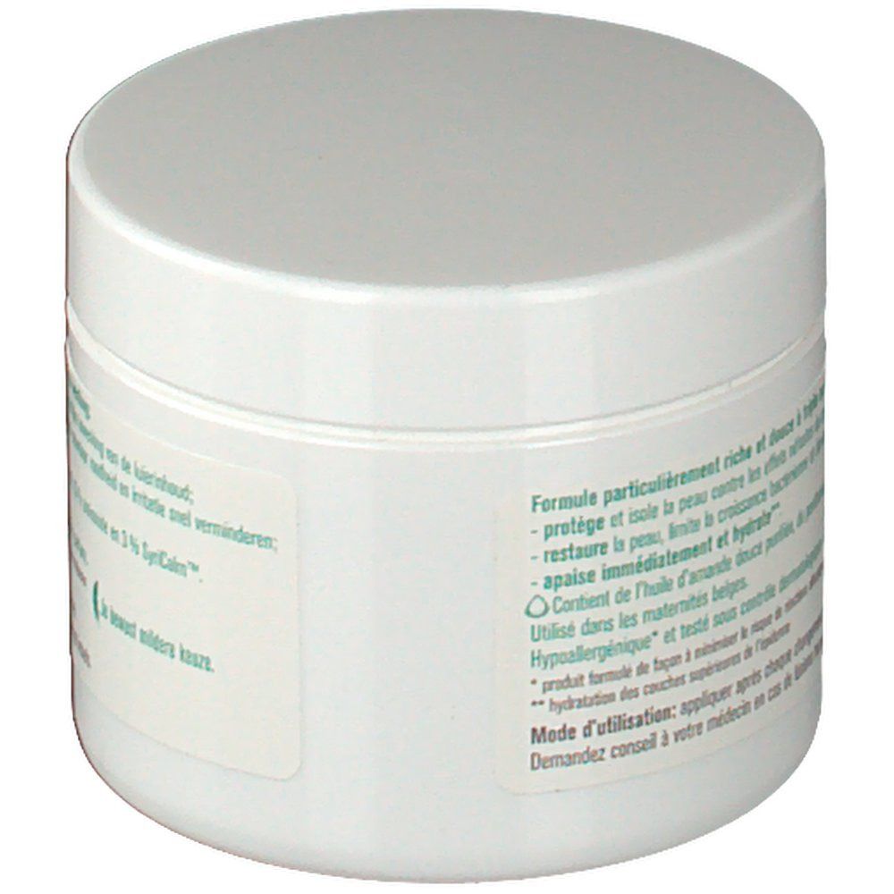 Weißes, rundes Tiegel mit Deckel. Auf dem Etikett Text über die Inhaltsstoffe und die Wirkung des Produkts.