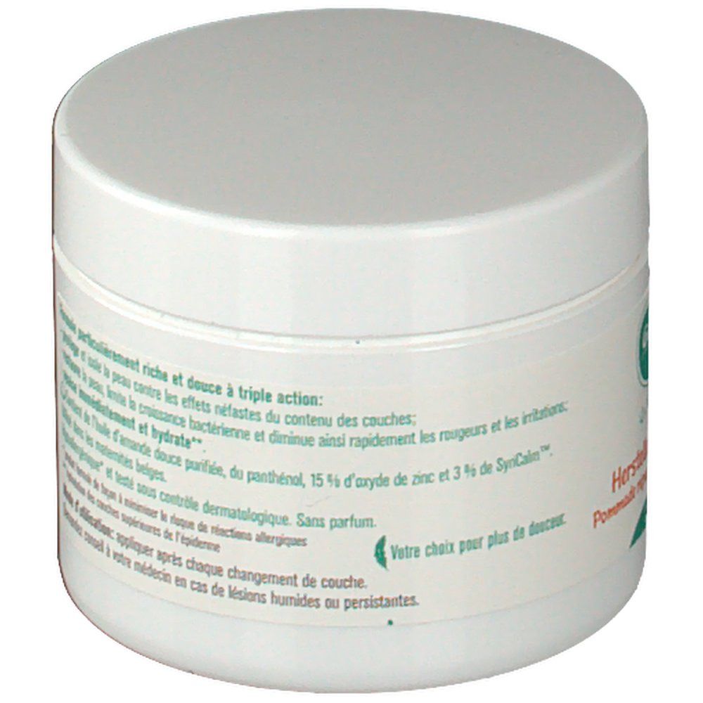 Weißes, rundes Tiegel mit Deckel. Auf dem Etikett Text über die Inhaltsstoffe und die Wirkung des Produkts.