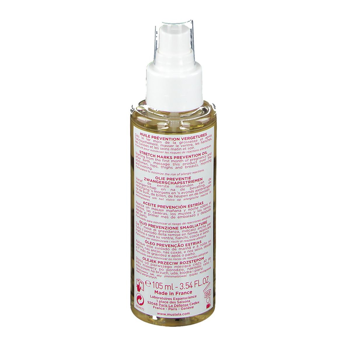 Flacon d'huile avec vaporisateur. Étiquette avec informations produit multilingues. Contenu clair.
